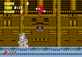 Archivo:120px-knuckles vs silver sonic.png