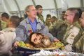 Bush junto a su plato favorito, ensalada a la Hussein.